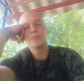 Николай